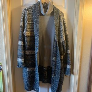 Long cardigan and turtle neck sweater